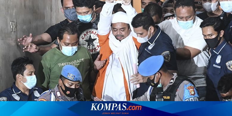 rizieq-digiring-ke-mobil-tahanan-dengan-tangan-terikat