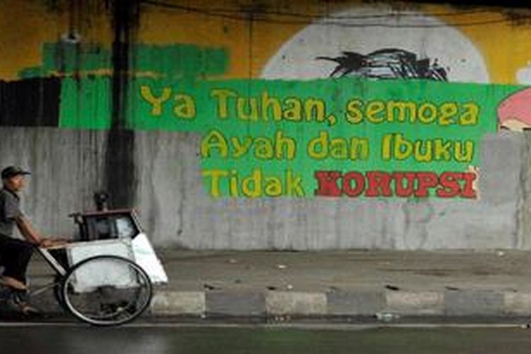 Mural antikorupsi di Jalan Jenderal Gatoto Subroto, Jakarta, Sabtu (16/3/2013).