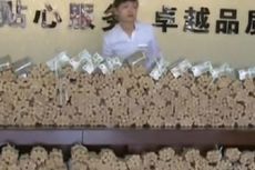 Seorang Pria di China Beli Mobil dengan Uang Koin Seberat 4 Ton