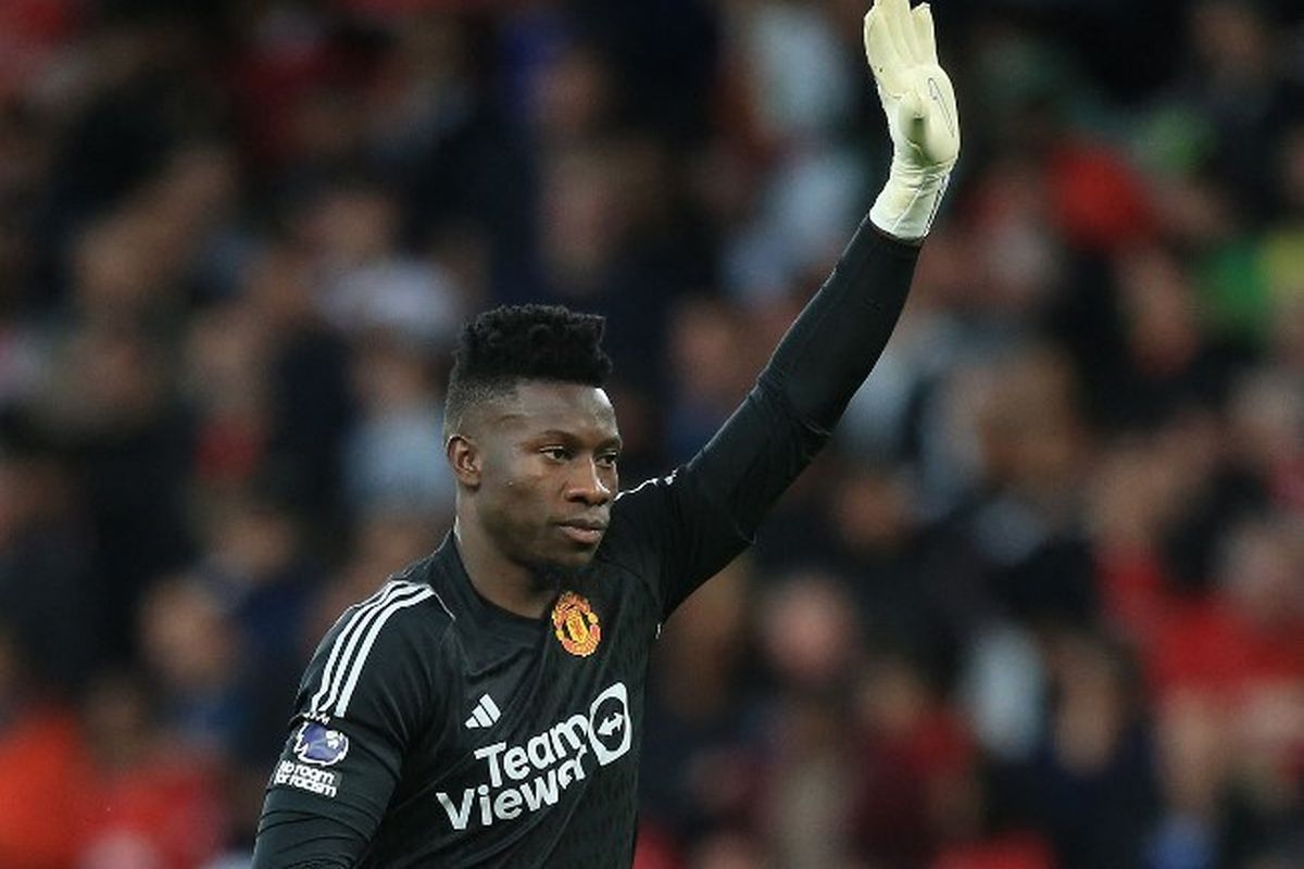 Andre Onana kala mentas dalam laga pekan pertama Liga Inggris 2023-2024 antara Man United vs Wolves di Stadion Old Trafford, 14 Agustus 2023. (Photo by Lindsey Parnaby / AFP)
