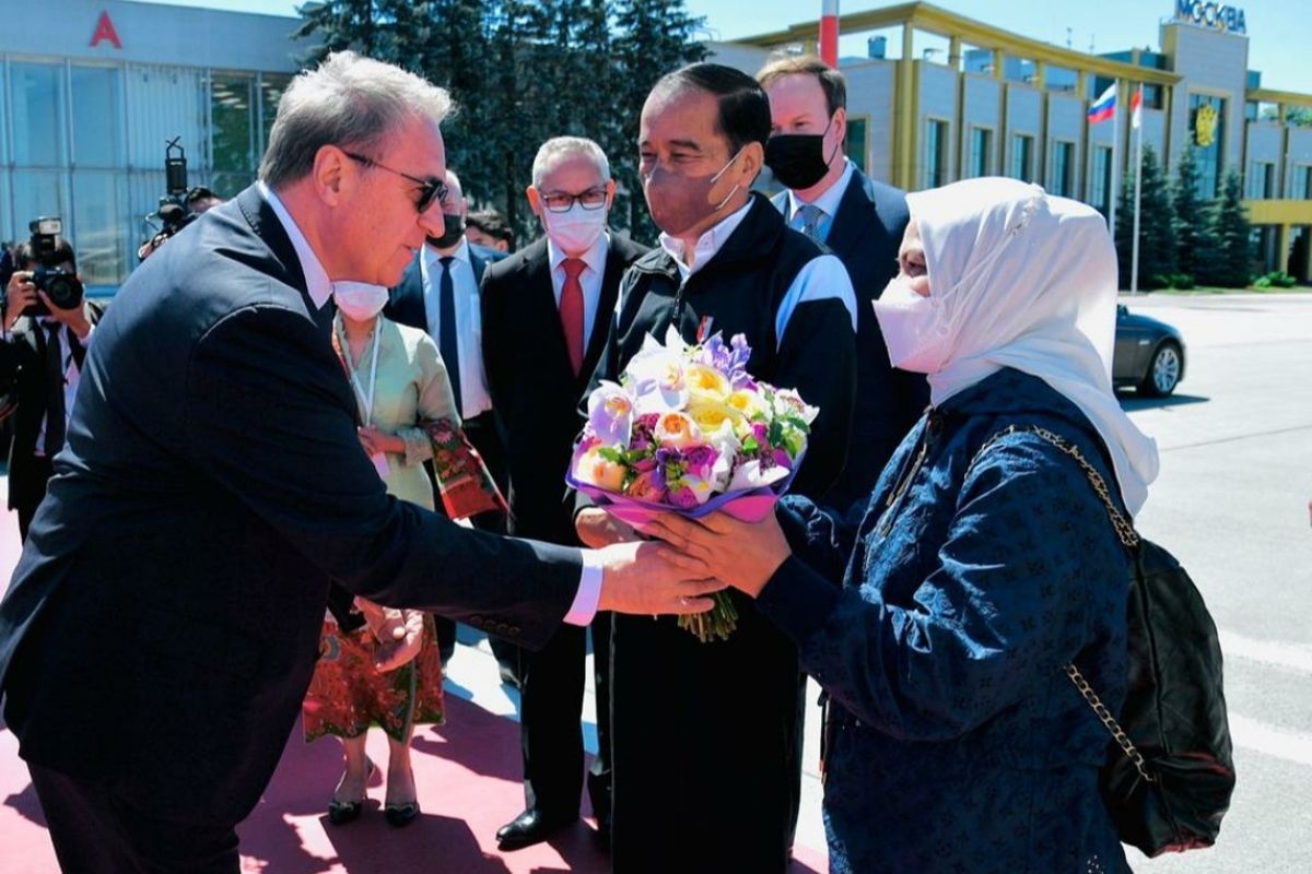 Indonesia's President Joko Widodo (2nd right) and First Lady Iriana Joko Widodo (right) landed at Vnukovo International Airport after a two-hour of flight from Poland by the Indonesian flag carrier Garuda Indonesia GIA-1 on Thursday, June 30, 2022.   