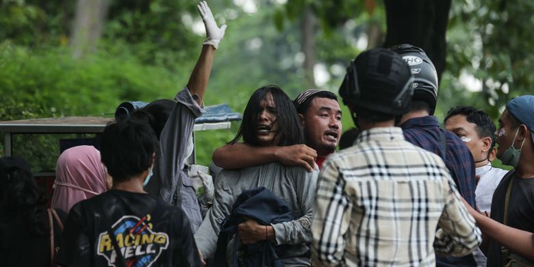 Indonesian Police arrests a protester in front of the parliament building in Senayan, Jakarta during demonstration following a rise in food prices and a possible elongation of President Joko Widodo?s term in office on Monday, April 11, 2022. The student protest in Jakarta ends in chaos. 