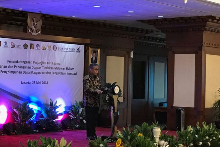 Ketua Dewan Komisioner OJK, Wimboh Santoso saat memberi sambutan di Jakarta, Jumat (25/5/2018).