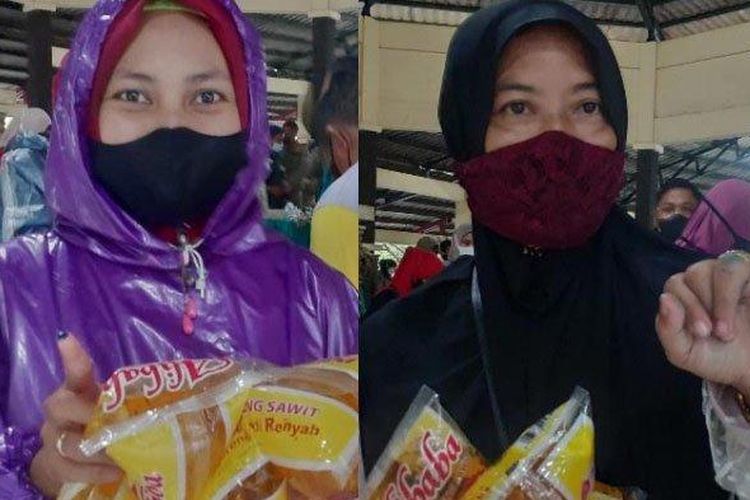 Pembeli minyak goreng murah di operasi pasar murah minyak goreng (migor) di GOR Tuban, Jumat (18/2/2022) pagi. 
