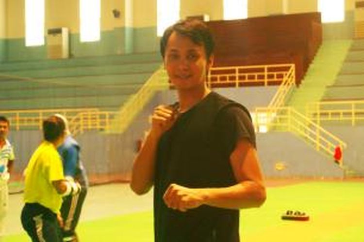 Atlet pelatnas taekwondo nomor kyorugi (tarung), Basuki Nugroho, berpose di sela latihan rutin di GOR POPKI, Cibubur, Jakarta Timur, Jumat (19/7/2013). 