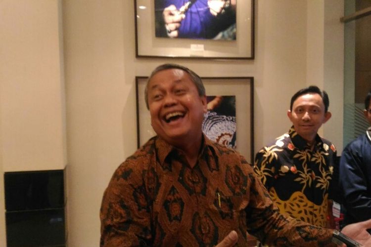 Gubernur Bank Indonesia Perry Warjiyo selepas jumpa pers di Gedung Thamrin Kompleks Bank Indonesia, Jakarta, Jumat (25/5/2018).