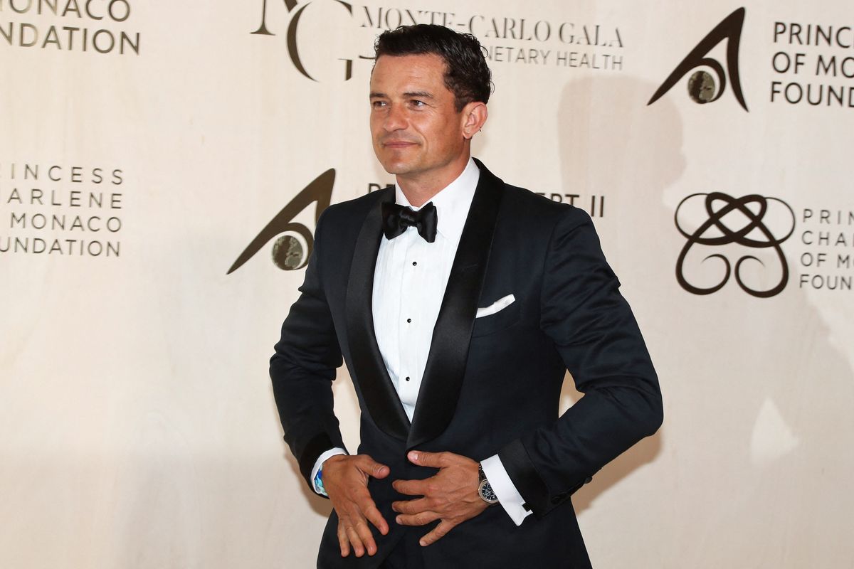 Aktor Inggris Orlando Bloom berpose selama sesi pemotretan menjelang Gala Monte-Carlo 2021 untuk Kesehatan Planet di Palais de Monaco, di Monaco, pada 23 September 2021.
