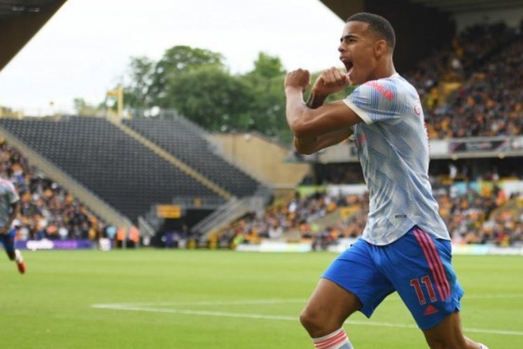 Pemain Manchester United Mason Greenwood merayakan gol pada laga Liga Inggris Wolves vs Man United di Stadion Molineux, Minggu (29/8/2021) malam WIB