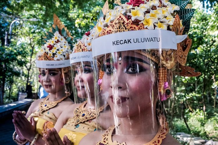 Balinese dancers practicing health protocols in the so-called Island of the Gods