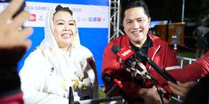 Menteri Pemuda dan Olahraga (Menpora) Erick Thohir bersama Ketua Umum Federasi Panjat Tebing Indonesia (FPTI) Yenny Wahid. (Dok. Kemenpora)