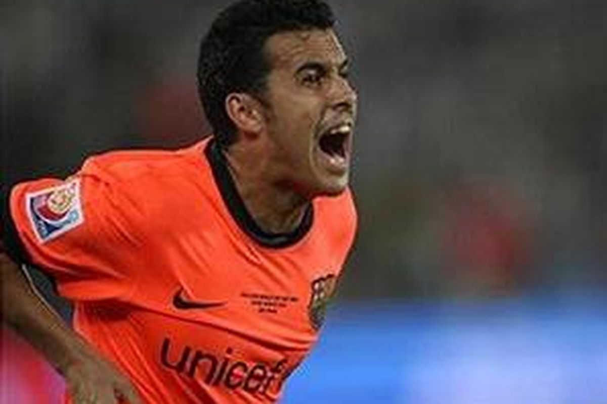 Pedro Rodriguez merayakan golnya ke gawang Estudiantes pada final Piala Dunia Antarklub di Abu Dhabi, Sabtu (19/12/2009).