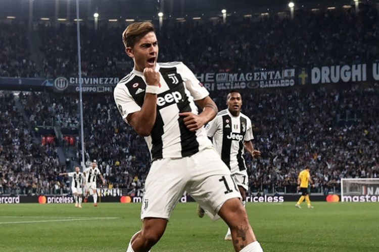 Penyerang Juventus, Paulo Dybala, merayakan gol yang dicetak ke gawang Young Boys dalam laga Grup H Liga Champions di Juventus Stadium, Turin, Italia pada 2 Oktober 2018.
