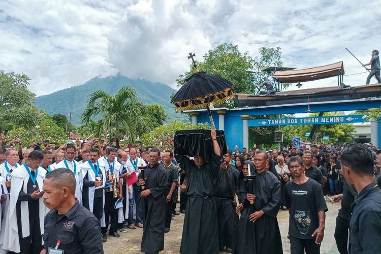 Catholic Christian devotees attend the Semana Santa ceremony, a local tradition observed as part of Holy Week celebrations in Larantuka on April 7, 2023.
