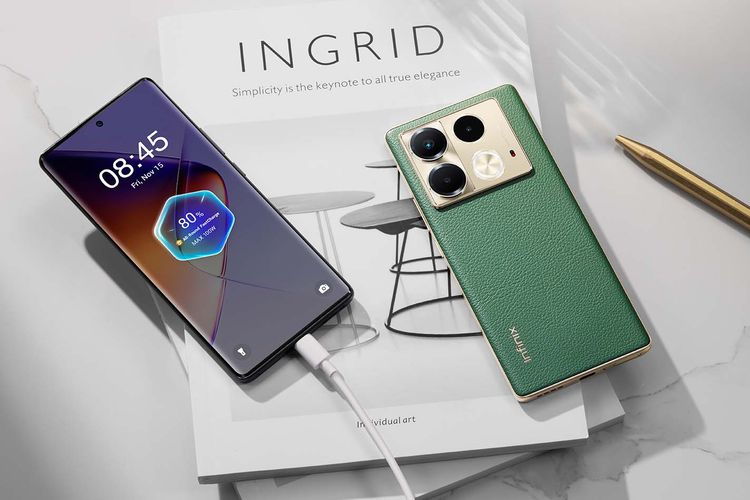 Spesifikasi Infinix Note 40S yang menggunakan layar lengkung AMOLED. Bagian punggung ponsel ini terdapat tiga pengaturan kamera belakang dengan kamera utama 108 MP. 