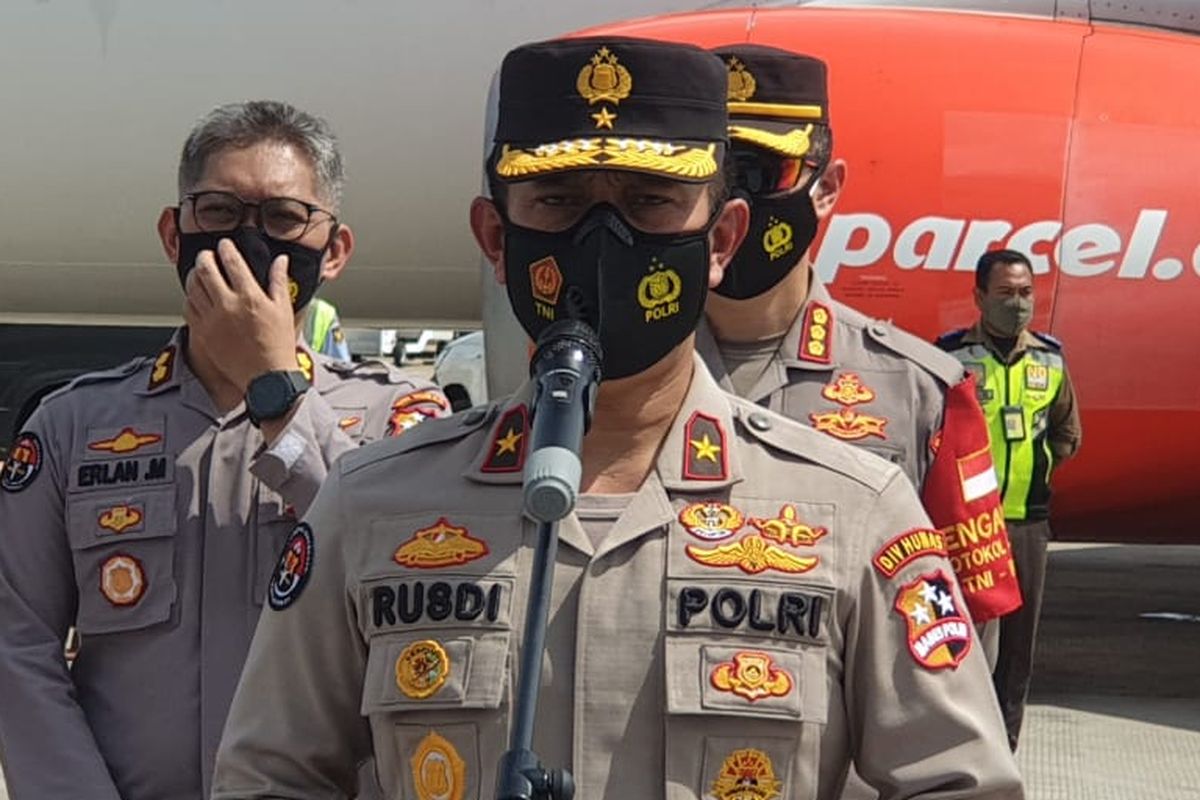 The National Police's Spokesman Brigadier General Rusdi Hartono speaks during a press conference on 19 terrorist suspects from Makassar at the Soekarno-Hatta Airport in Tangerang near Jakarta on Thursday, February 4, 2021.  