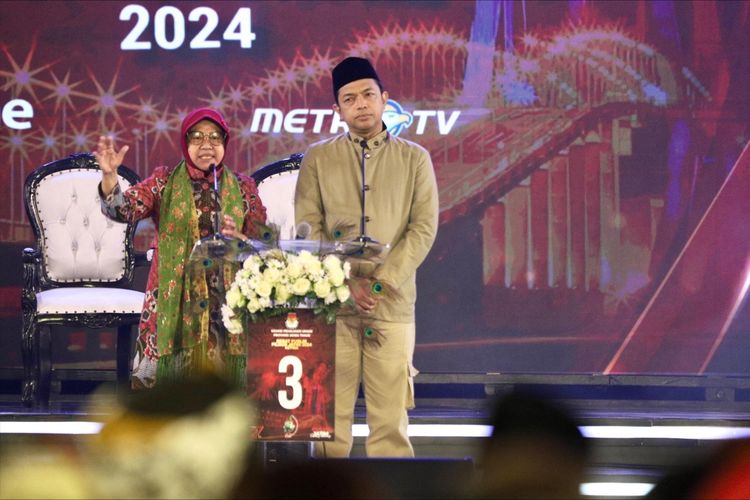 Calon gubernur Jawa Timur (Jatim) nomor urut 3 Tri Rismaharini dan Zahrul Azhar Asumta (Gus Hans) Dalam acara debat terakhir Pilgub Jatim 2024, Senin (18/11/2024).
