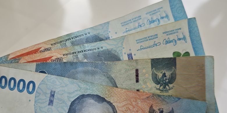 Ilustrasi uang. UMP 2026. UMP adalah. UMK adalah. UMR adalah.