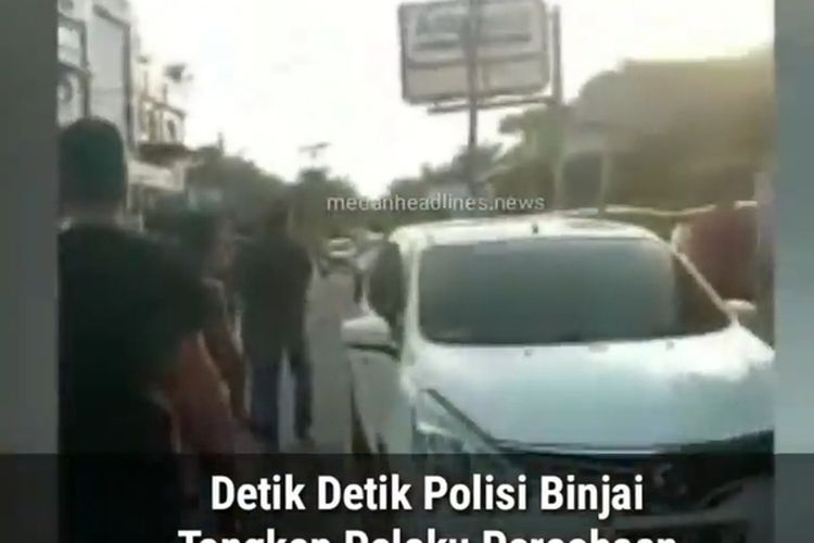 Tangkapan layar video yang diunggah di akun Instagram @medabheadlines.news memperlihatkan penangkapan pelaku percobaan pembunuhan di pinggir jalan di Binjai.