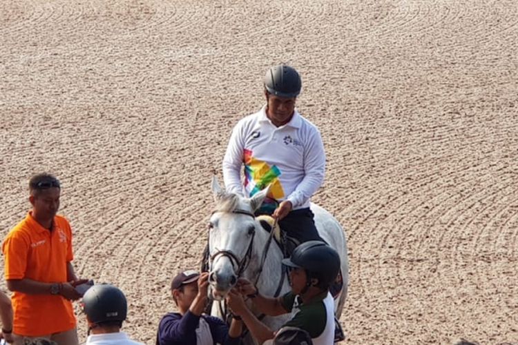 Menteri Pertanian Andi Amran Sulaiman saat melakukan kunjungan kerja ke Jakarta Equistrian Park (JEP) di Pulomas, Sabtu (14/7/2018).