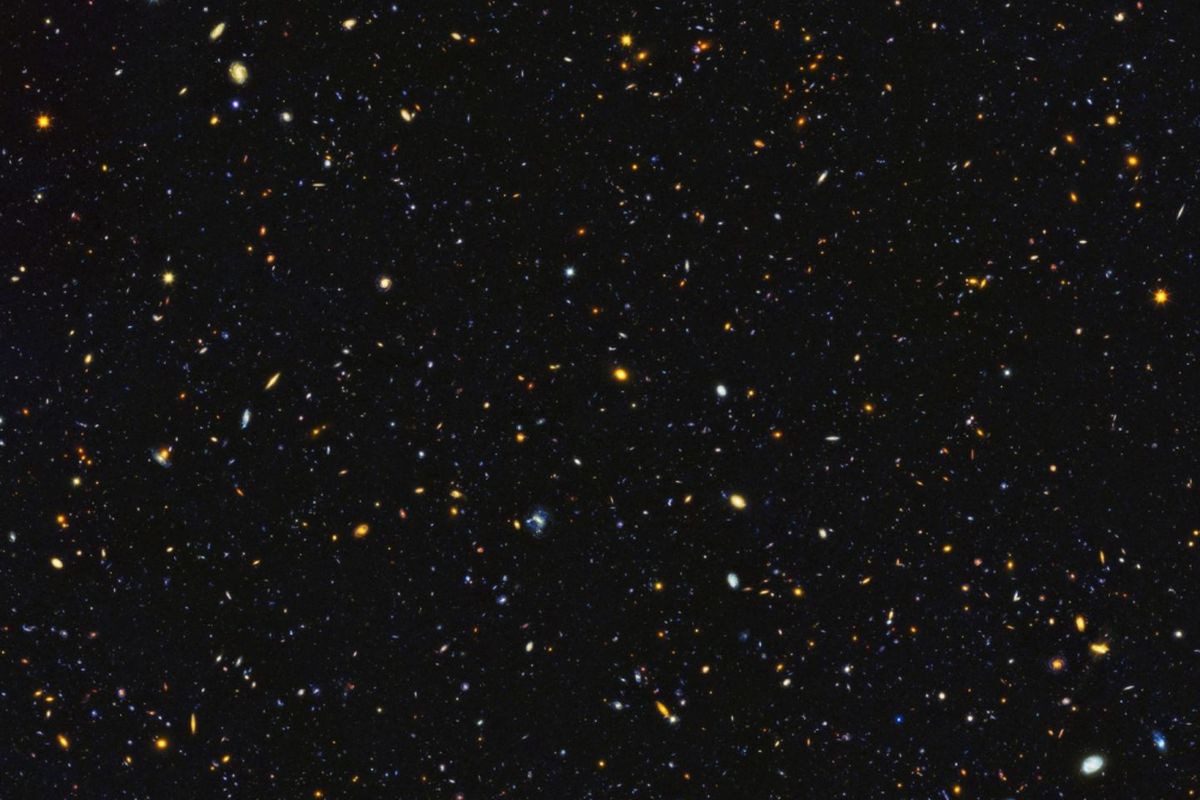 Teleskop Luar Angkasa Hubble milik NASA telah menangkap salah satu pemandangan terbesar dari kelahiran bintang dan galaksi di alam semesta miliaran tahun lalu
