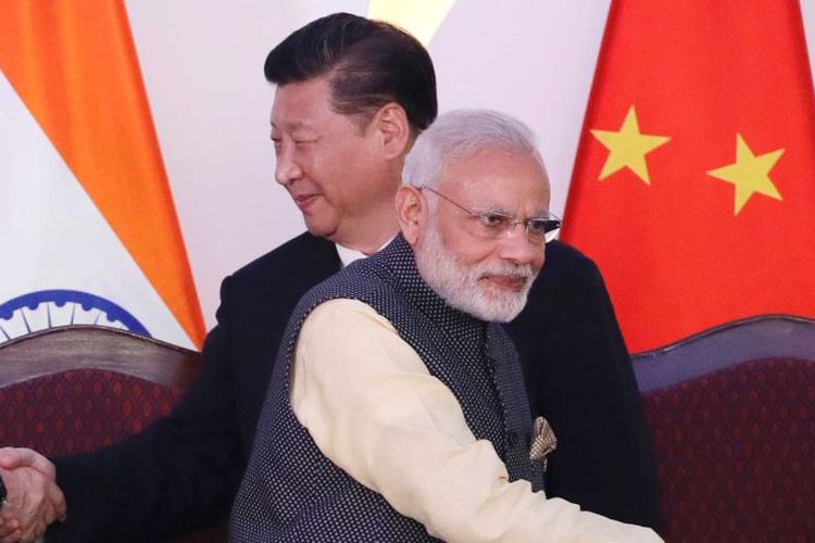 Presiden China Xi Jinping dan Perdana Menteri India Narendra Modi 