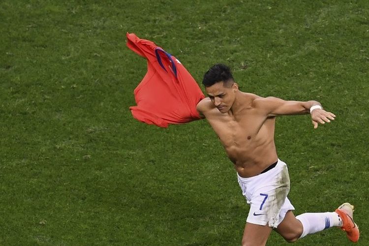 Alexis Sanchez merayakan keberhasilannya mengeksekusi penalti pada pertandingan Kolombia vs Cile dalam babak perempat final Copa America 2019 di Corinthians Arena, 28 Juni 2019. 