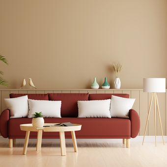 Ilustrasi ruang tamu minimalis bernuansa warna beige dengan sofa warna merah tua.