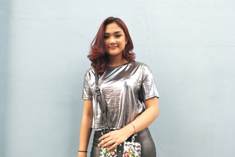 Penyanyi Marion Jola saat diabadikan di Gedung Trans TV, Tendean, Jakarta Selatan, Selasa (8/5/2018).