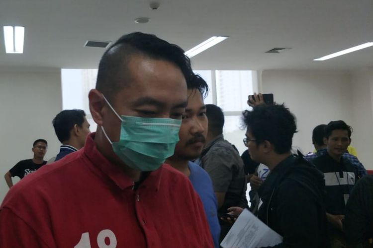 Andi Wibowo, pengemudi BMW yang keluarkan senjata saat macet di Gambir, Jakarta Pusat, ditangkap polisi, Sabtu (15/6/2019).