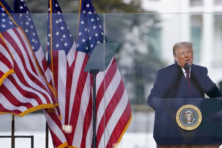 With the White House in the background, President Donald Trump speaks at a rally Wednesday, Jan. 6, 2021, in Washington. (AP Photo/Jacquelyn Martin)