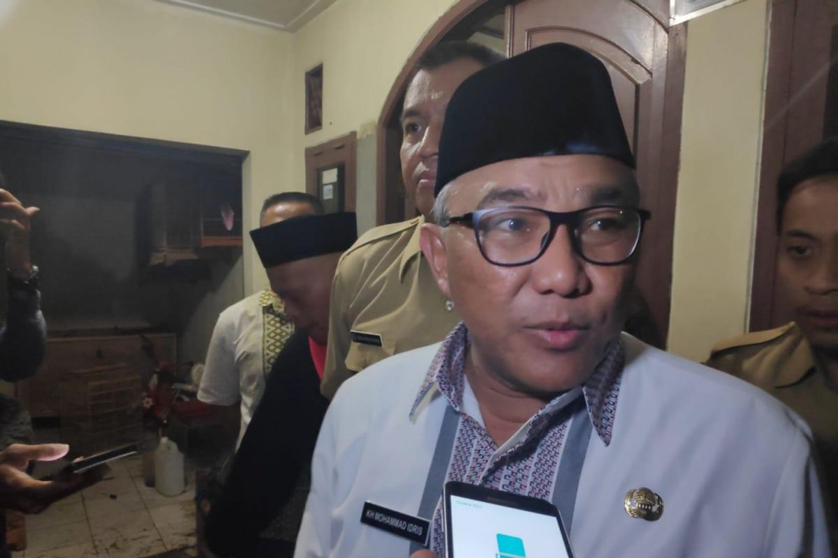 Wali Kota Depok,  Mohammad Idris saat kunjungi rumah Bayi F di Ciampeun,  Tapos,  Depok,  Senin (11/2/2019).