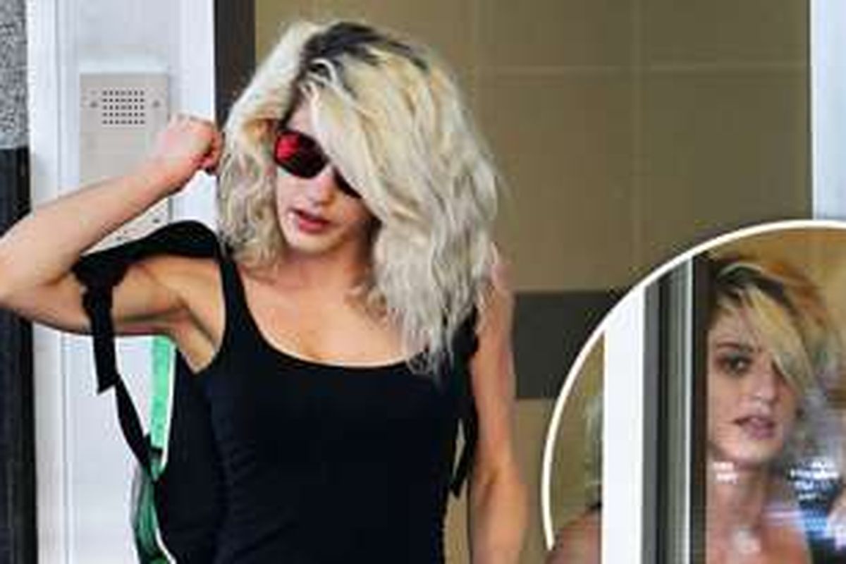 A woman documenting her sexual encounter with a dog