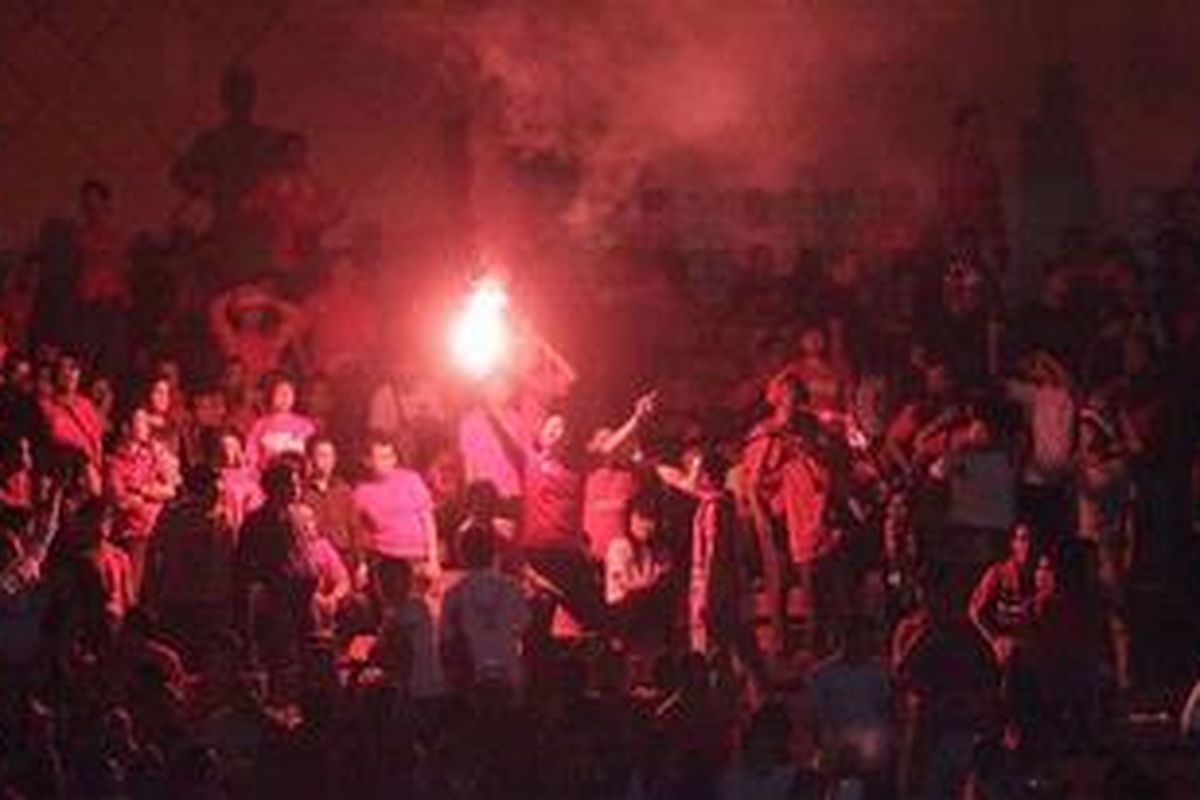 Ilustrasi aksi suporter Indonesia. 