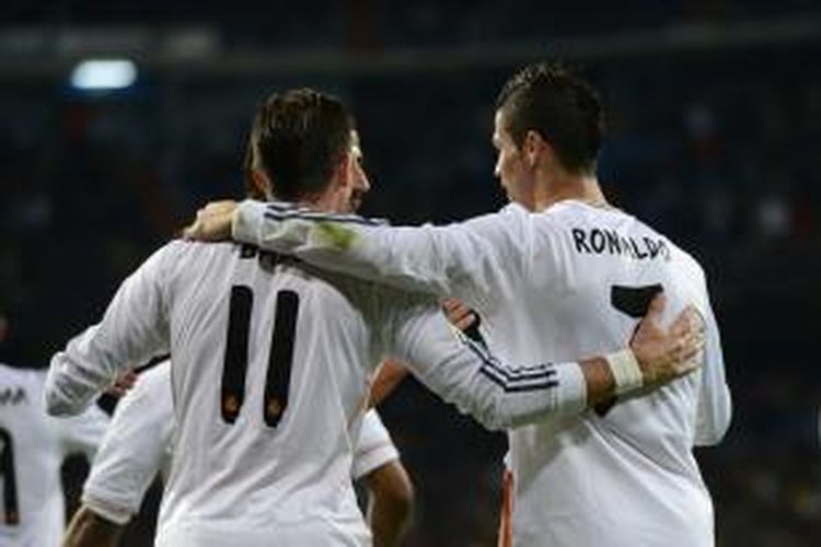 Gelandang Real Madrid, Gareth Bale (kiri) bersama Cristiano Ronaldo. 