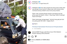 Viral, Petugas Dishub Nyangkut di Depan Mobil Pikap