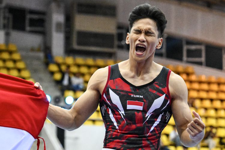 Pesenam putra Indonesia Abiyurafi meluapkan kegembiraannya usai meraih medali emas pada nomor palang tunggal SEA Games 2025 di Gymnasium 5 Thammasat University, Pathum Thani, Bangkok, Thailand, Jumat (12/12/2025). Abiyurafi berhasil meraih medali emas dengan total skor 13.400 sedangkan medali perak diraih pesenam Thailand Weerapat Chuaisom dengan total skor 13.200 dan medali perunggu diraih pesenam Vietnam Phuong Than Dinh dengan total skor 13.133. ANTARA FOTO/Nova Wahyudi/bar