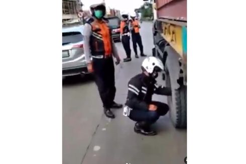 Viral Video Petugas Dishub di Bekasi Kempiskan Ban Truk, Ini Alasannya...