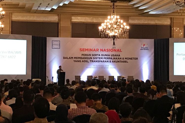 Suasana Seminar Nasional Peran Serta Dunia Usaha dalam Membangun Sistem Perpajakan dan Moneter yang Adil, Transparan, dan Akuntabel di Grand Ballroom Hotel Kempinski, Jumat (14/9/2018). Seminar ini digelar oleh Apindo bersama Kadin Indonesia dan dihadiri Menteri Keuangan Sri Mulyani Indrawati.