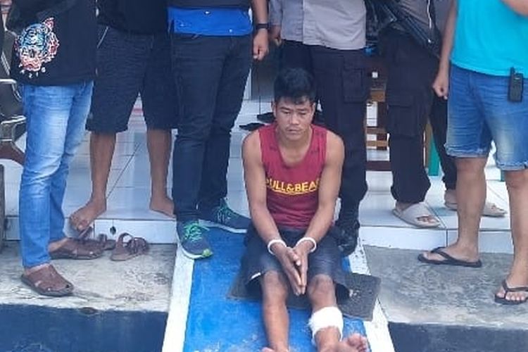 Riki (32) residivis curas yang menjadi tersangka pembunuhan saat berada di Polsek Karang Dapo, Kabupaten Musi Rawas Utara (Muratara), Sumatera Selatan, Rabu (31/8/2022).