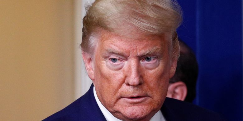 Presiden Amerika Serikat Donald Trump hadir dalam konferensi pers harian mengenai kebijakan pemerintah menangani virus corona di Gedung Putih, Washington, pada 3 April 2020.