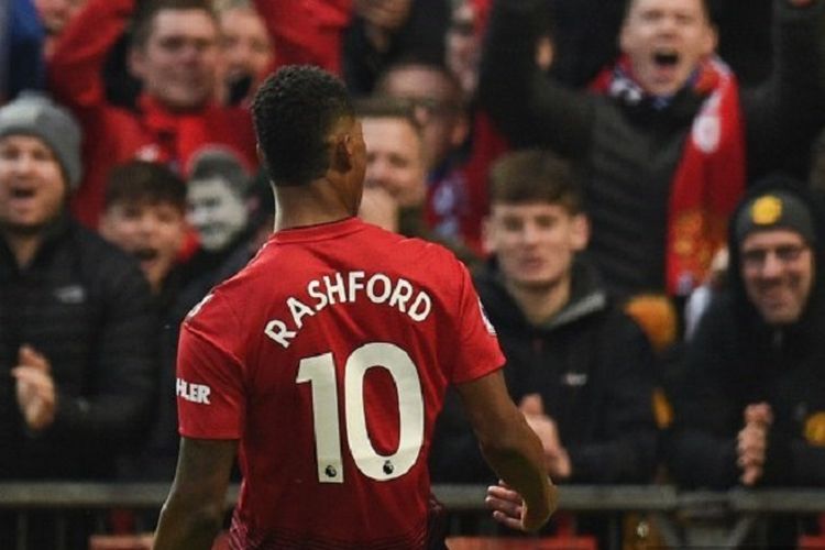 Striker Manchester United, Marcus Rashford, merayakan golnya dalam pertandingan Liga Inggris antara Manchester United dan Brighton & Hove Albion di Old Trafford, Sabtu 19 Januari 2019.