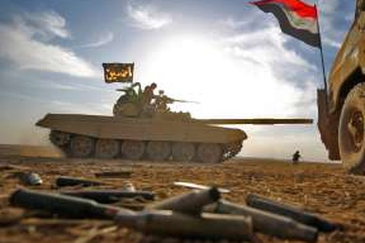 Pasukan Irak mempertahankan posisi di desa Tall al-Tibah, 30 kilometer sebelah selatan kota Mosul yang menjadi target utama.