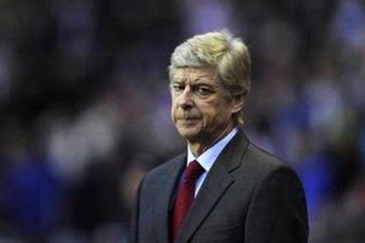 Reaksi manajer Arsenal, Arsene Wenger, menjelang laga Piala FA melawan Sunderland di Sunderland, Sabtu (18/2/2012).