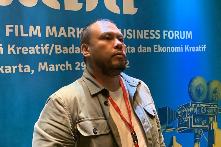 Sutradara Joko Anwar usai menghadiri sesi diskusi dalam acara forum Akatara Indonesian Film Business & Film Market 2022, Selasa (29/3/2022), di kawasan Setiabudi, Jakarta Selatan. 