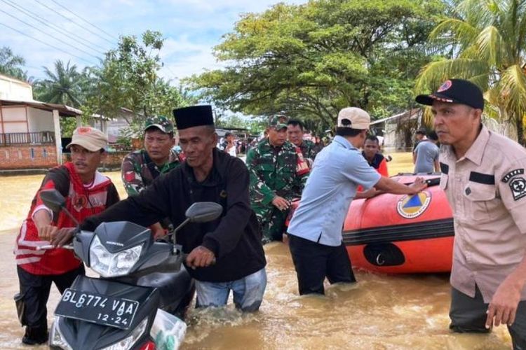 Hujan Deras Dua Hari, Sungai Meluap dan Putuskan Jalan Lintas di Nagan Raya