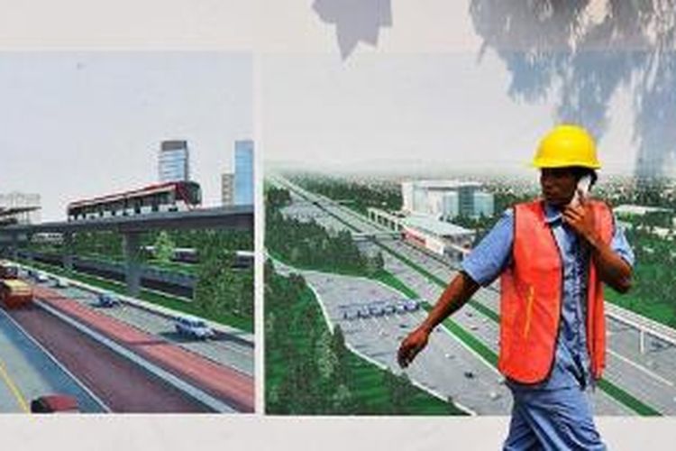 Pekerja melintas dekat proyek sistem transportasi kereta ringan (light rail transit/LRT) yang diresmikan pembangunannya dengan peletakan batu pertama oleh Presiden Joko Widodo di kawasan Taman Mini Indonesia Indah, Jakarta, Rabu (9/9/2015). Pembangunan dua koridor awal LRT, yakni Cibubur-Cawang-Dukuh Atas sepanjang 24,2 kilometer (km) dan rute Bekasi Timur-Cawang-Dukuh Atas sepanjang 17,9 km, membutuhkan anggaran Rp 23,8 triliun dan ditargetkan selesai dalam waktu tiga tahun.