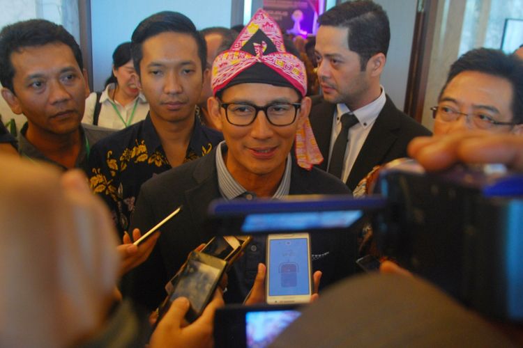 Calon Wakil Presiden Sandiaga Uno saat menghadiri acara Pelantikan Pengurus Himpunan Pengusaha Muda Indonesia Kota Bogor, di IPB International Convention Center, Senin (3/9/2018).