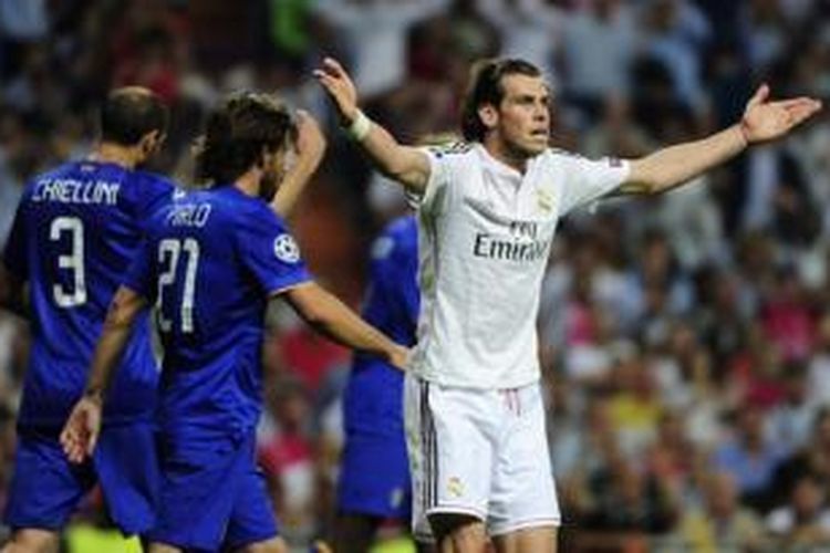 Salah satu ekspresi winger Real Madrid, Gareth Bale, dalam pertandingan leg kedua semifinal Liga Champions melawan Juventus, Rabu (13/5/2015). 