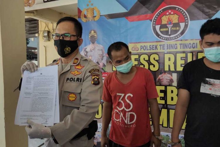 Ekri Sucipto (26) dan Johan (28) dua pelaku pembuat laporan palsu saat berada di Polsek Tebing Tiggi, Kabupaten Empat Lawang, Sumatera Selatan.