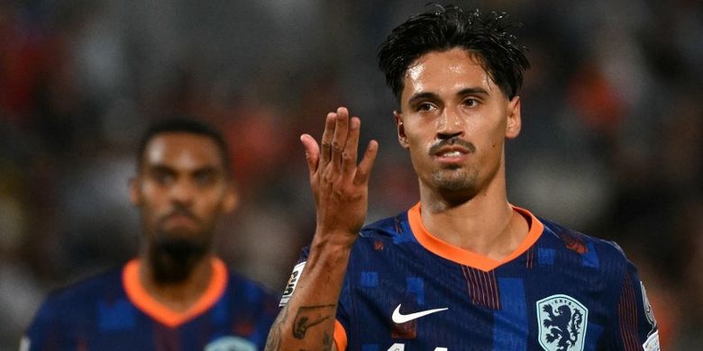 Tijani Reijnders (kanan) merayakan gol dalam pertandingan Kualifikasi Piala Dunia 2026 antara Malta vs Belanda di Stadion Nasional di Ta' Qali, pada 9 Oktober 2025. (Foto oleh Alberto PIZZOLI / AFP)